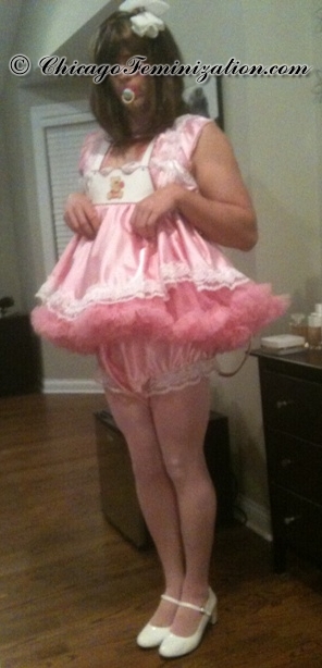 Sissy Baby Jessica has on a baby harness and has a pacifer in her mouth Sissy Baby Jessica
